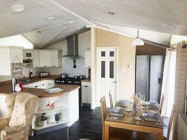 Willerby New Hampshire 3 Dining table for four and an open plan kitchen.