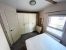 Europa Willow 12 Europa Willow master bedroom with large storage space and ensuite
