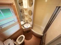 Atlas Sherwood Super 12 Bathroom with shower space in affordable, family-friendly static home.