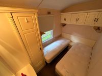 Atlas Sherwood Super 11 Twin bedroom in affordable, family-friendly static home, with built-in storage space