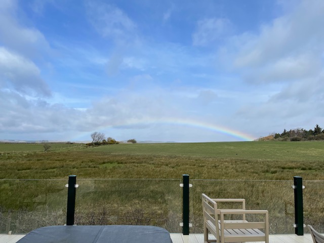 Open landscape with chairs and wide skies near Heathergate holiday homes