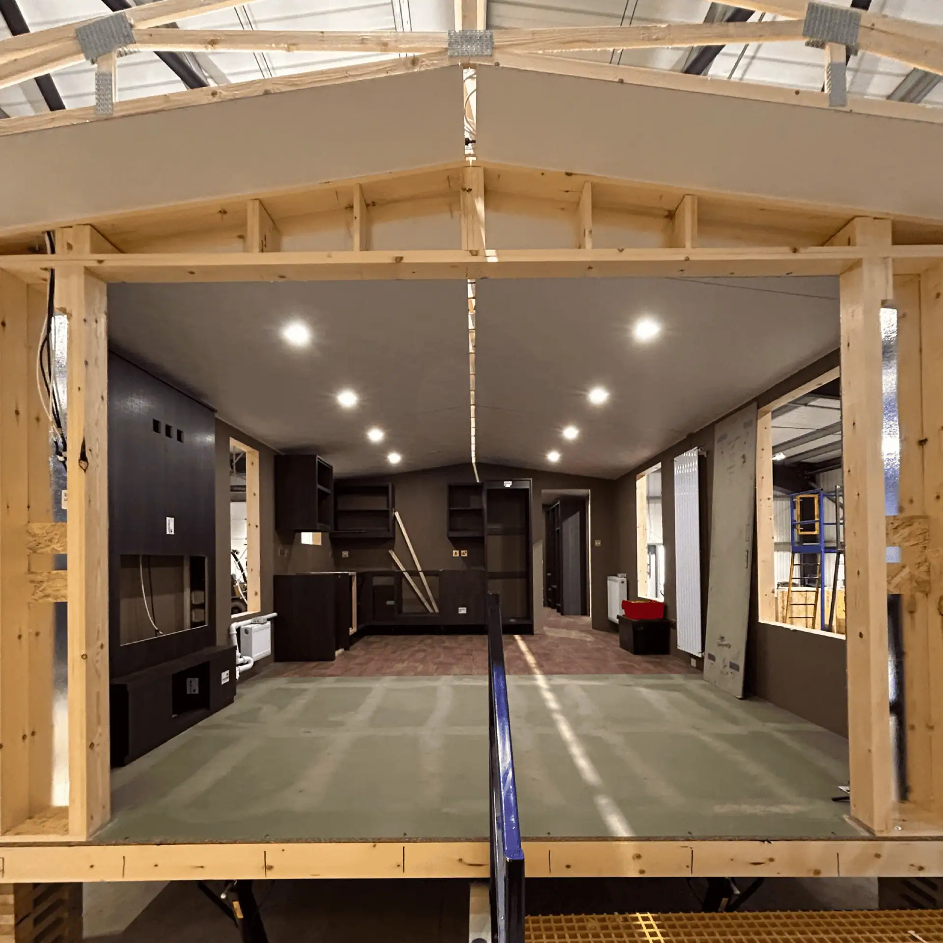 NP – The Inspire Lodge-05 close-up of sink and tap with water pouring out the tap.